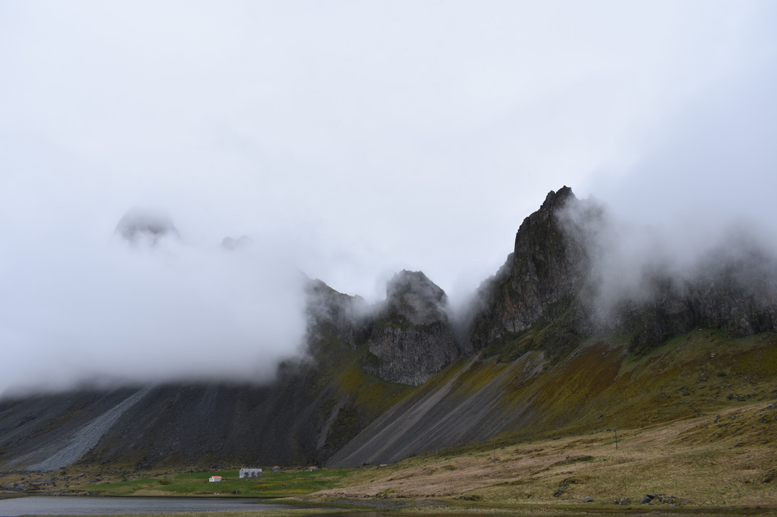 Fog rolling over mountains in Iceland
